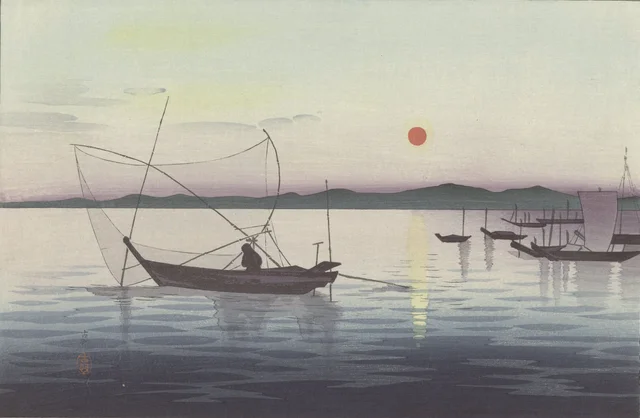 Bateaux et soleil couchant