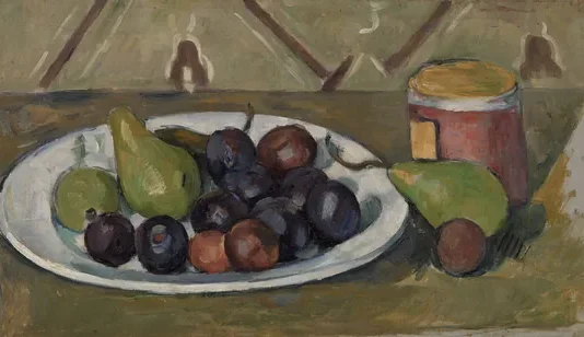 Assiette avec fruits et pot de conserves