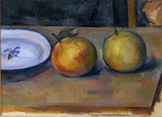 Deux pommes sur une table