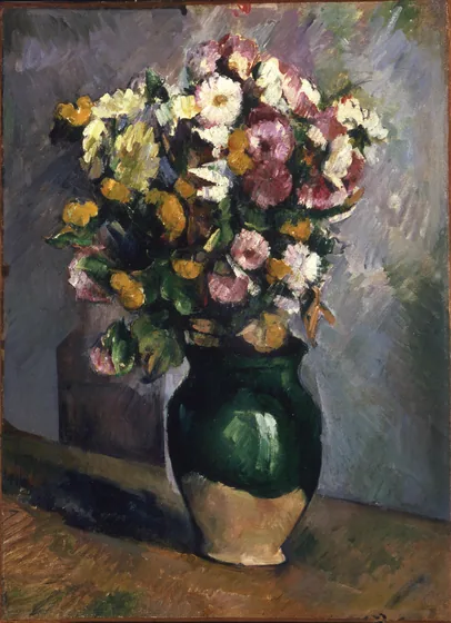 Fleurs dans un pot d'olives