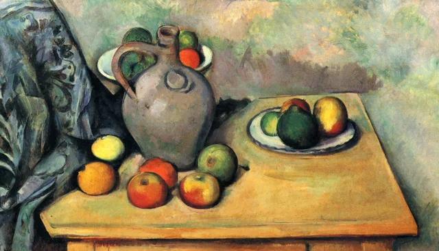 Jarra y frutas sobre una mesa
