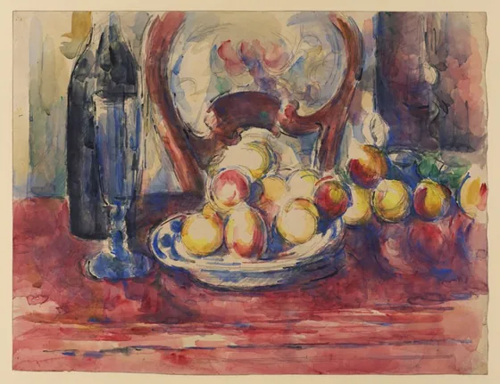 Pommes, bouteille et dossier de chaise