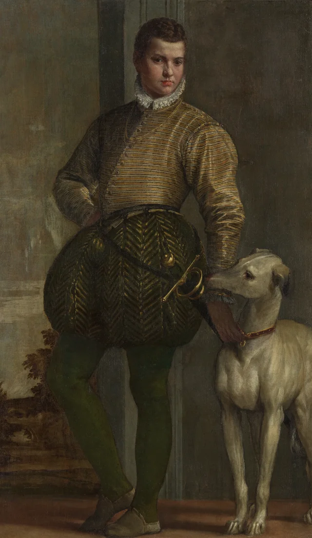 Garçon avec un lévrier