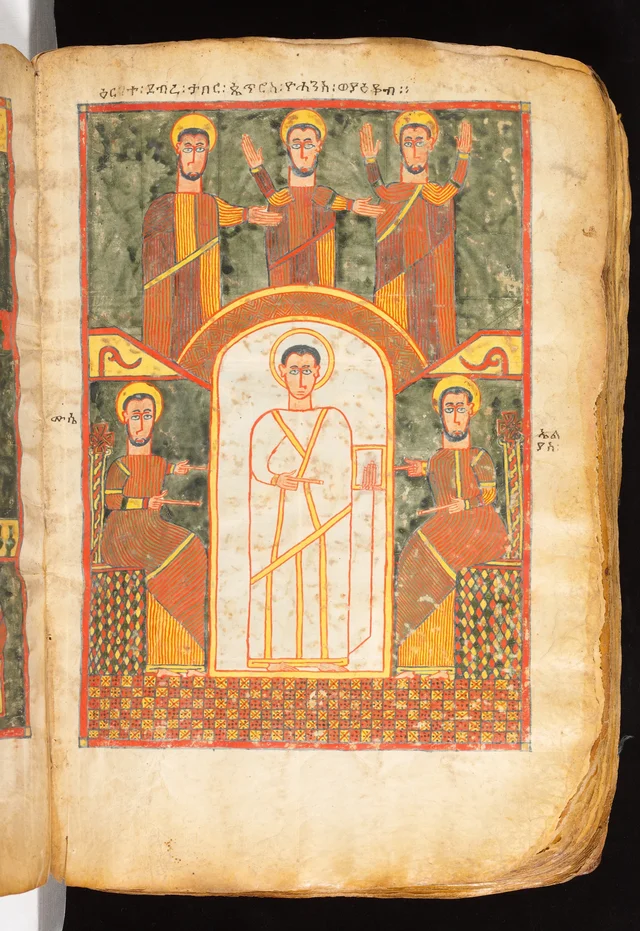 Book of the Gospels: haloed figure in a white robe in an arched niche