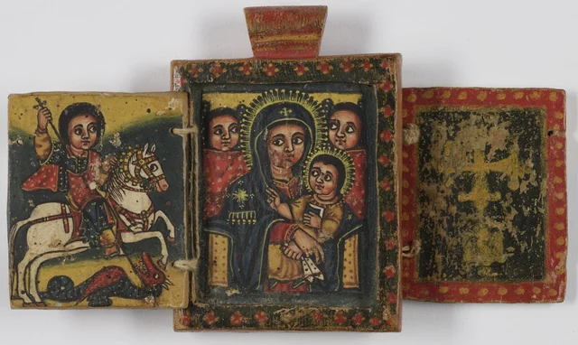 Icône pendentif recto verso avec la Vierge à l'Enfant, saint Georges et la Kʷərʿatä rəʾəsu avec Täklä Haymanot et le donateur (face A)