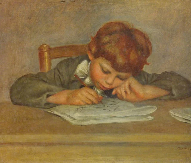 Niño pequeño escribiendo