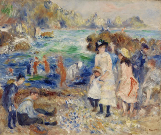 Niños a la orilla del mar en Guernesey
