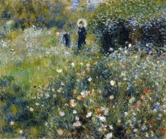 Mujer con sombrilla en un jardín