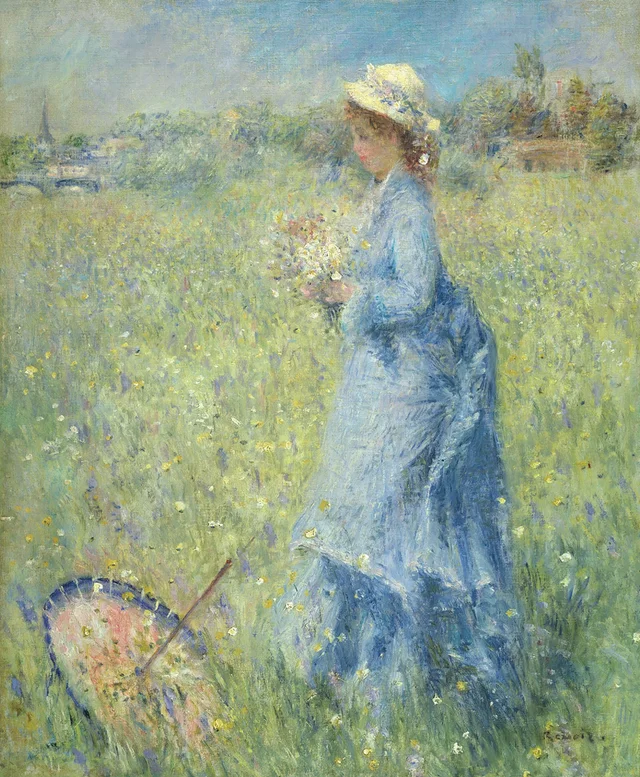 Mujer cogiendo flores