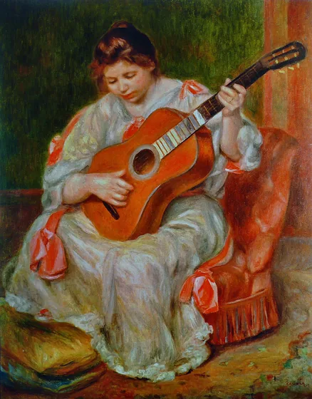 Femme jouant de la guitare
