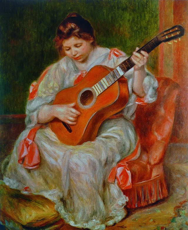 Femme jouant de la guitare