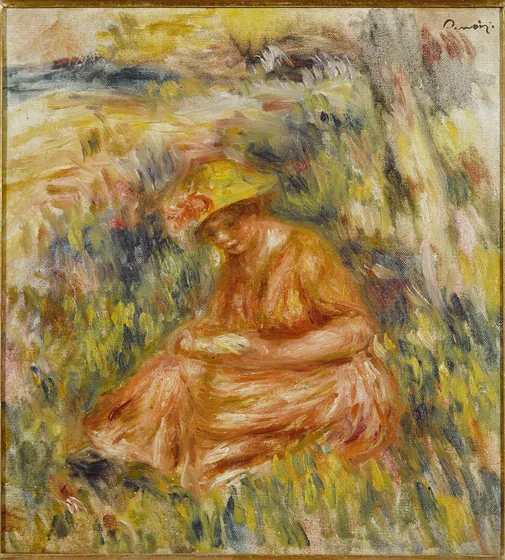 Femme lisant dans un paysage