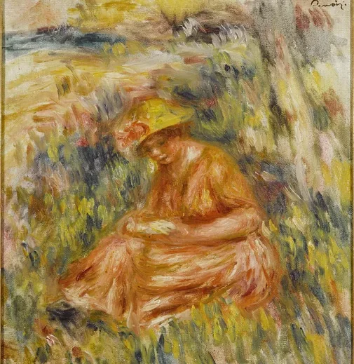Femme lisant dans un paysage