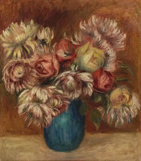 Fleurs dans un vase vert