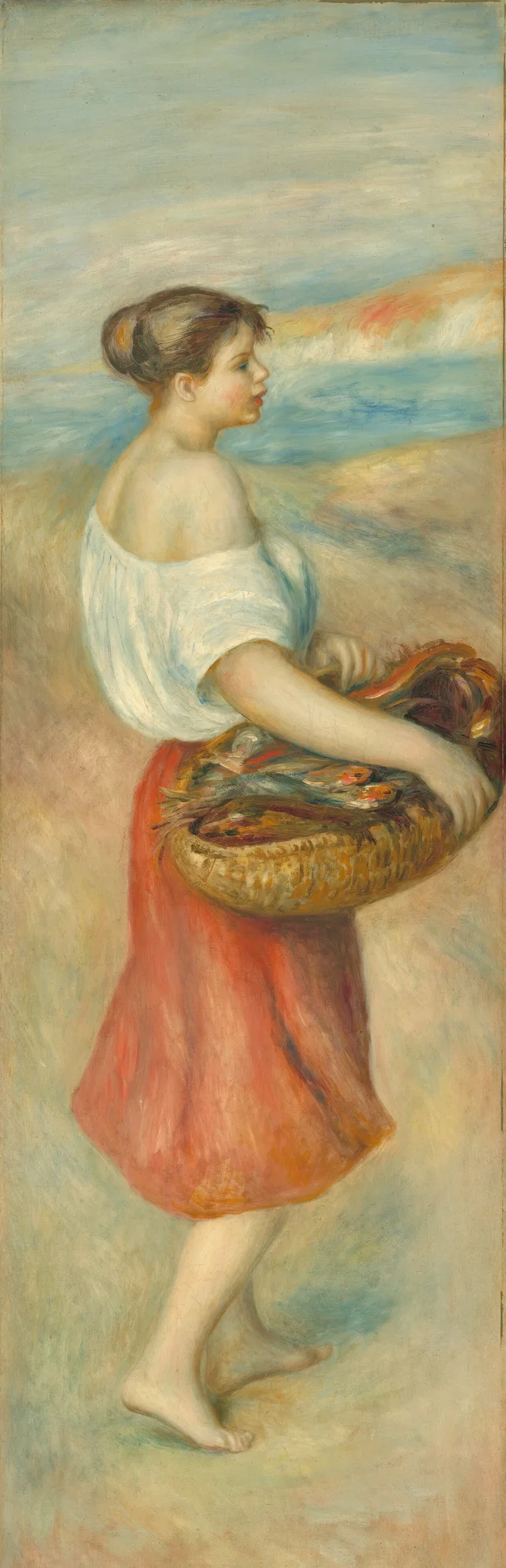 Joven con una cesta de pescado