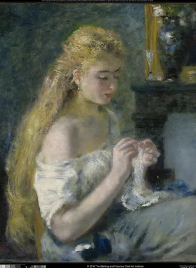 Jeune femme cousant