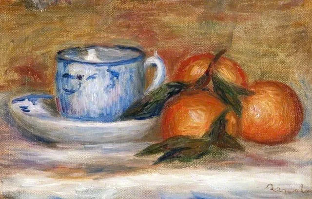 Taza y mandarinas