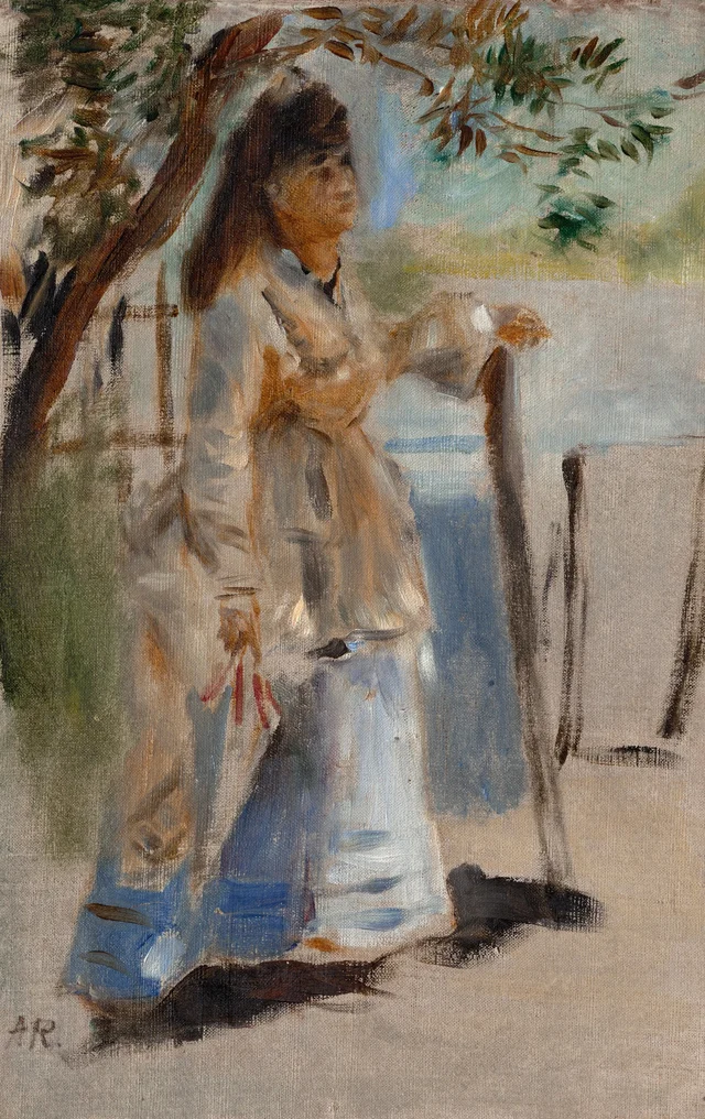 Mujer junto a una valla