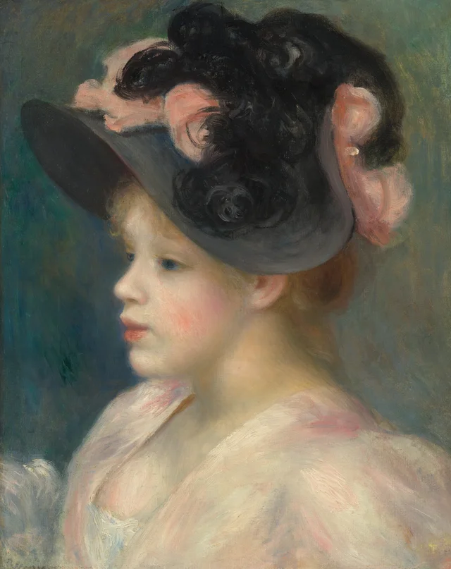 Joven con sombrero rosa y negro