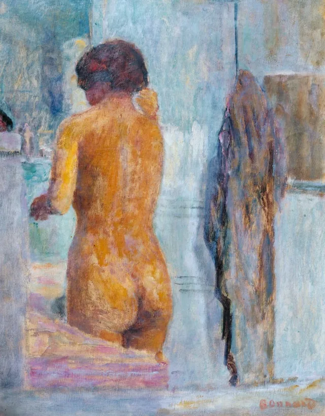 後ろ向きの水浴の女