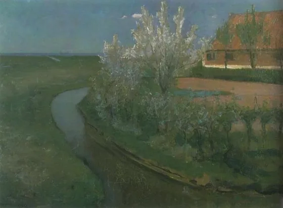 Curved irrigation ditch bordering farmyard with flowering trees