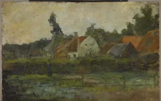 Farm buildings with fence in foreground