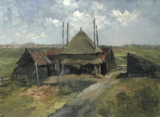 Haystack and farm sheds in a field