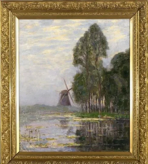 Mill near tall trees with bright color reflections