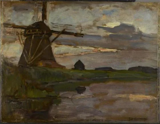 Oostzijdse mill viewed from downstream with streaked blue and yellow sky