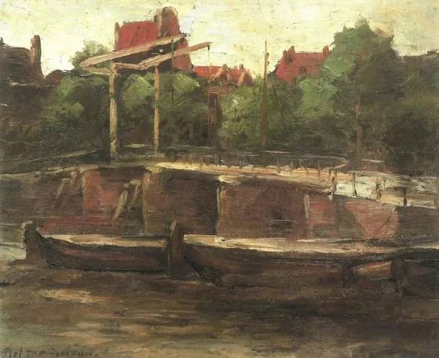 El Waalseilandgracht con puente y barcazas planas