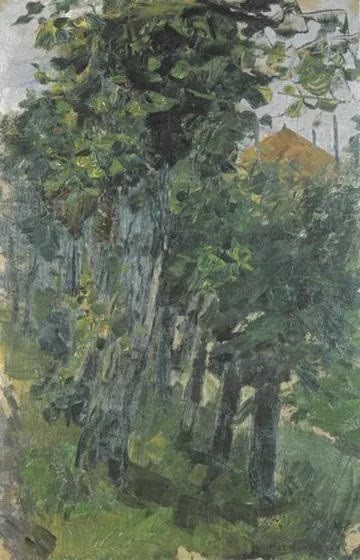 Willows bordering an irrigation ditch near a haystack
