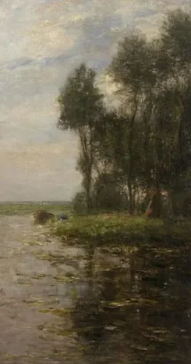 Windmill near tall trees