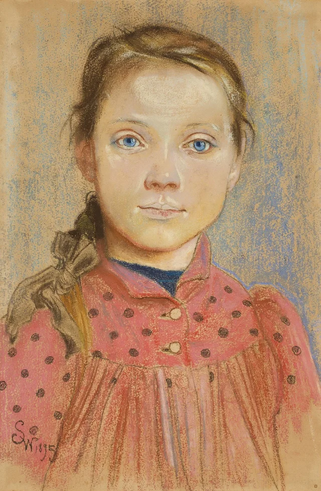 Menina de vestido vermelho de bolinhas