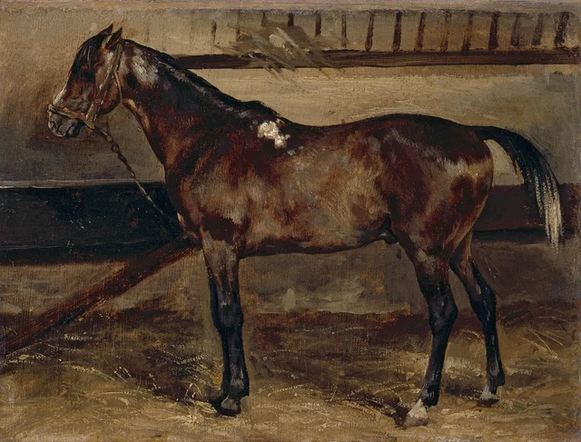 Caballo castaño en la cuadra