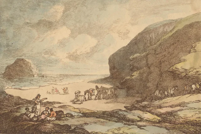 Cala en la playa rodeada de rocas