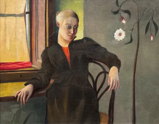Woman Sitting by the Window