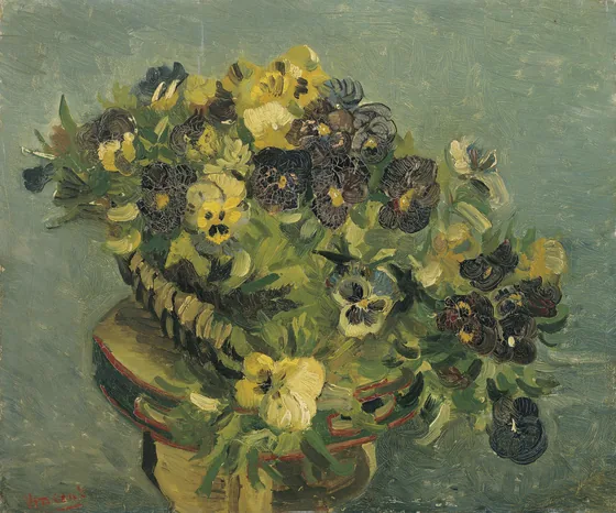 Basket of pansies on a small table