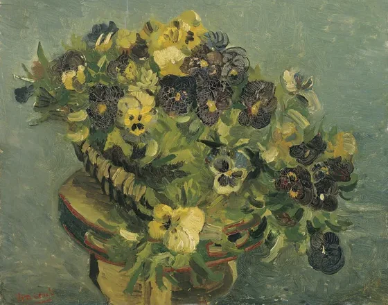 Basket of pansies on a small table