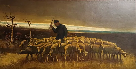 Berger avec un troupeau de moutons