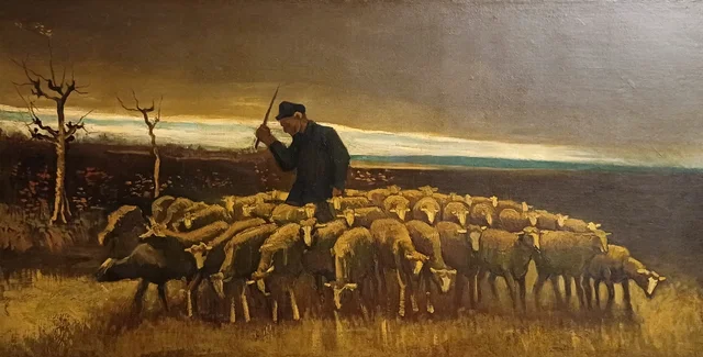 Pastor con un rebaño de ovejas