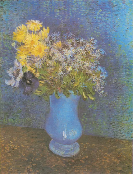 Bouquet de fleurs dans un vase bleu