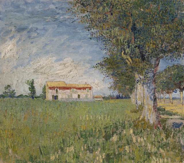 Granja en un campo de trigo