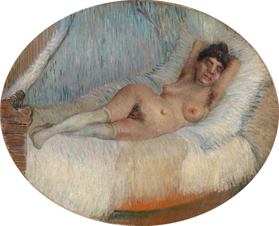 Femme nue sur un lit