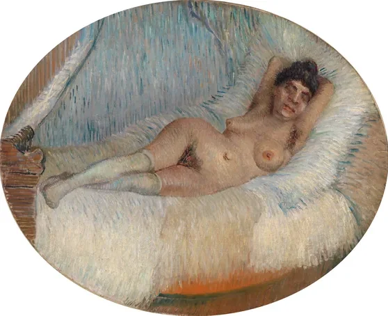 Femme nue sur un lit