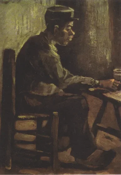 Homme à une table