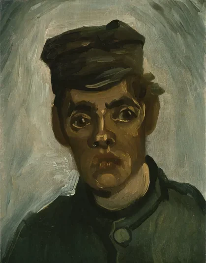 Tête d'un jeune paysan avec une casquette