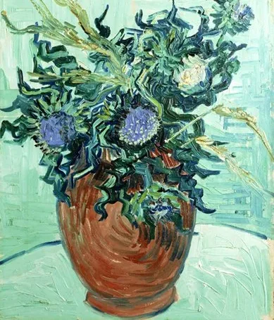 Vase with flowers and thistles